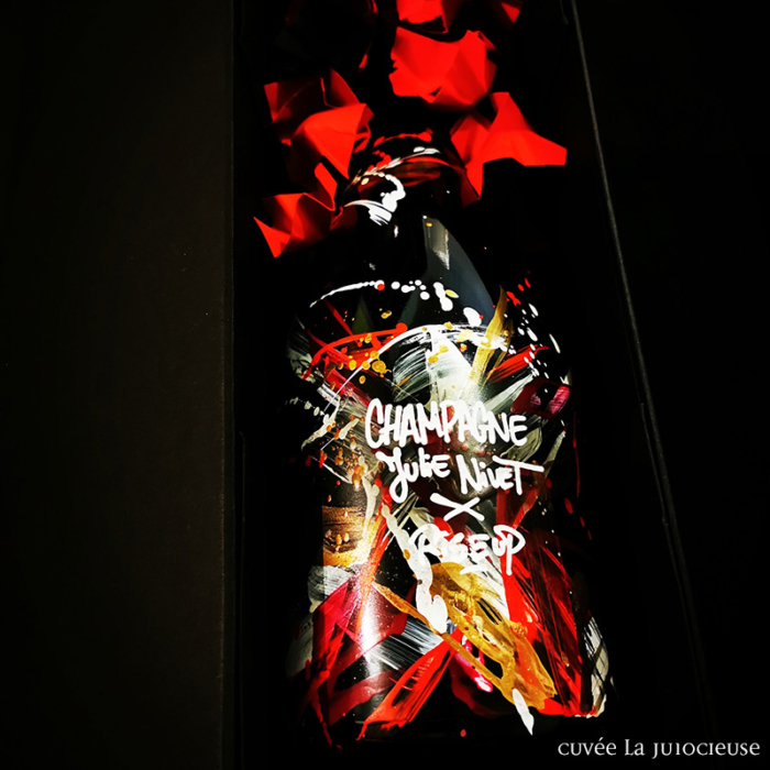 Bottle graffitied by Rise up - Julie Nivet