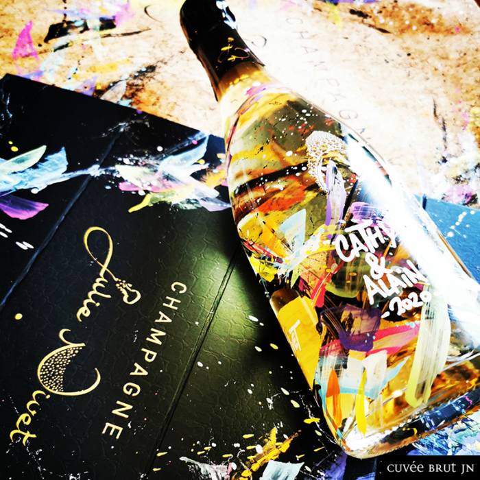 Bottle graffitied by Rise up - Julie Nivet